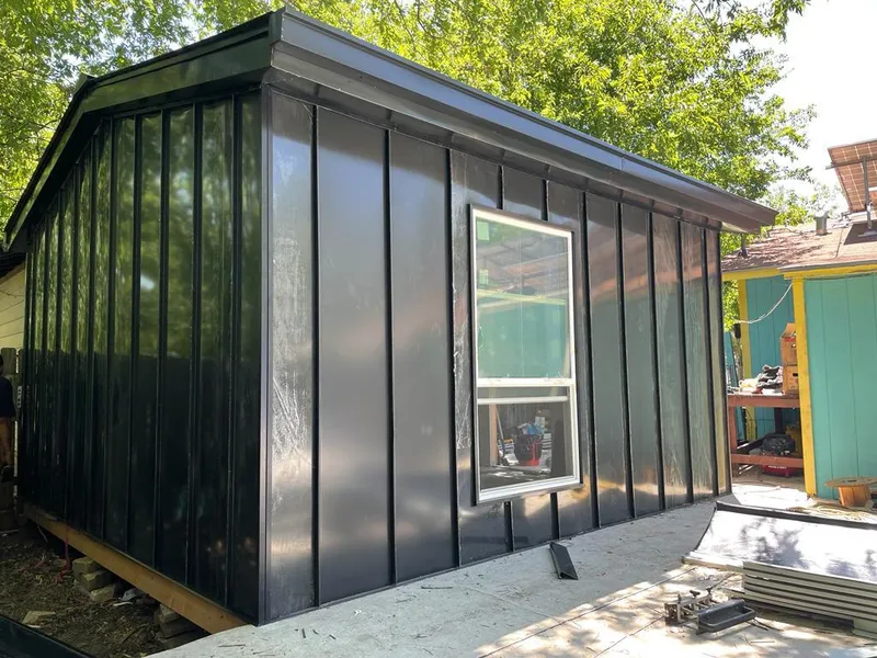 Black standing seam metal wall panels for Metal Roof Installation in Nyack