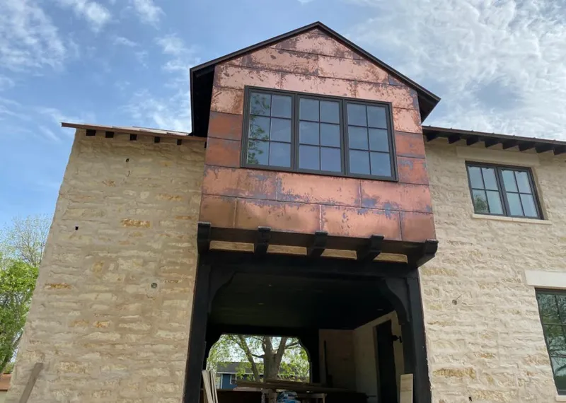 Copper metal panel facade on a stone building for Metal Roof Coating in Nyack