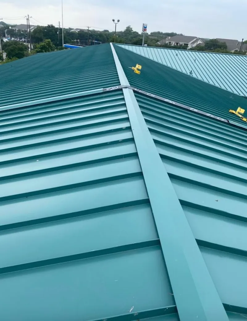Green commercial metal roof ridge and valley for Metal Roof Repair in Nyack